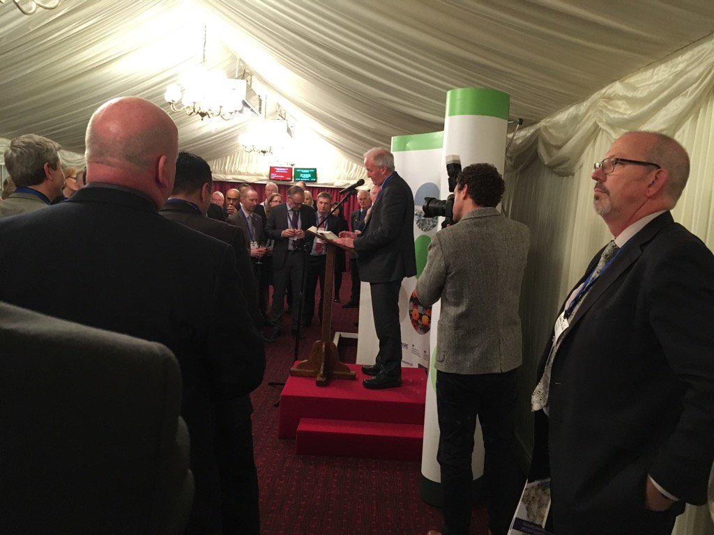Lord Cameron welcomes guests, looked on by former GFS Champion Tim Benton